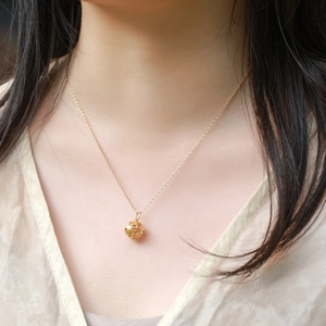 Elegant gold S925 sterling silver globe pendant necklace with delicate hollow-out design