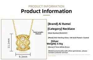 Detail of S925 silver cylinder pendant with brushed gold finish and white zircon stones