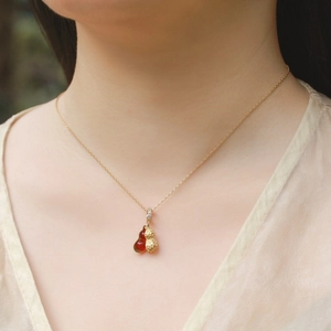 S925 silver peanut pendant necklace with red agate beads and a gold brushed finish