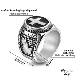 Detail view of 20mm men's vintage titanium steel cross ring with praying hands engraving