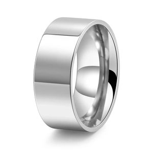 Macro view of wide silver-tone polished stainless steel band ring with mirror finish