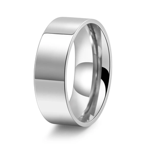 Close-up of a minimalist silver-tone flat band ring with a high-polished mirror finish