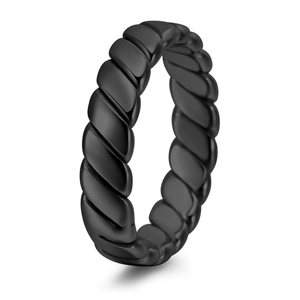 Close-up of black titanium steel ring featuring a geometric braided twist design