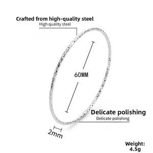 Detailed view of silver titanium steel bangle showing 60mm diameter and 2mm width