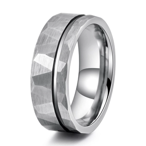 Detail of 8mm hammered tungsten ring with black groove and polished inner band