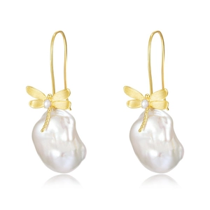 Handcrafted brushed gold dragonfly earrings with baroque pearls on a white background