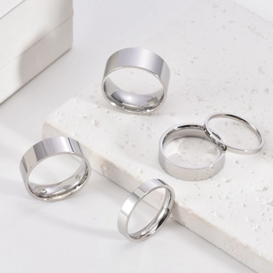 Polished silver stainless steel minimalist rings set in multiple widths for men and women