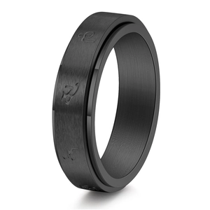 Detail of black brushed rotatable stainless steel ring with triathlon sport icons