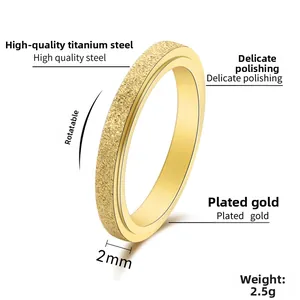 Detail view of 2mm spinner ring in 18K gold plated stainless steel with matte finish