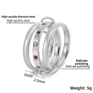 Detail of 18K gold titanium ring with multi-color stones and 5g weight measurement