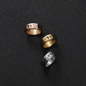 Titanium steel spinner rings in rose gold, gold and silver with sun moon star patterns