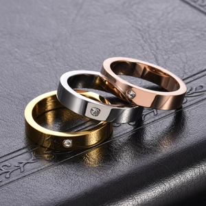 Three minimalist 18K gold-plated titanium steel rings with single crystal set on black leather