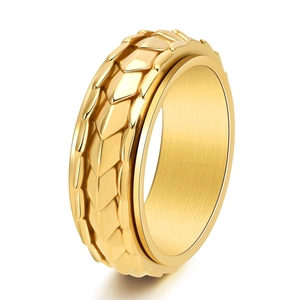 Golden titanium steel rotating dragon scale ring with a textured armor pattern finish