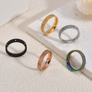 Set of five frosted titanium steel sunflower rings in gold silver and rose gold colors