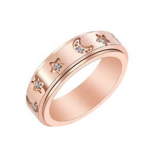 Rotating rose gold stainless steel ring with crystal-encrusted moon and star patterns