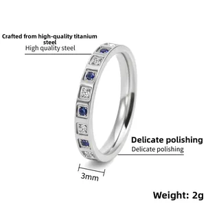 Detail of 3mm titanium steel ring featuring alternating blue and white cubic zirconia