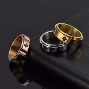 Set aus drei rotierenden Kleeblattringen in Gold, Silber und Roségold aus Titanstahl
