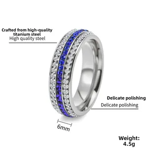 Detail of 6mm titanium steel ring featuring triple row micro-set blue and white stones