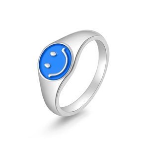 Minimalist silver smiley face ring with blue enamel inlay and modern polished finish