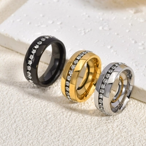 Polished titanium steel rings with full crystal inlay in black, gold, and silver finishes