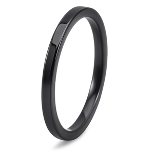Polished black ceramic minimalist ring with smooth mirror finish and sleek curved design