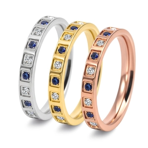 Three-color CNC square-set titanium rings with blue and white zircons in a tiered layout