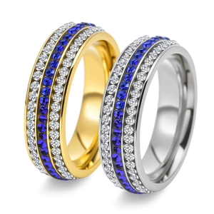 Luxury couple rings set in gold and silver with three rows of blue and white crystals