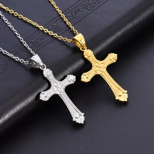 Titanium steel cross pendant necklaces in gold and silver finish with embossed details