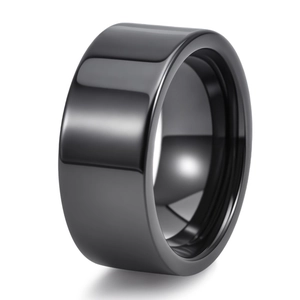Macro shot of wide black polished ceramic ring with high reflective surface finish