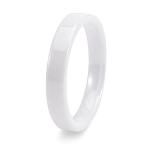 Detail view of a polished white ceramic ring with a glossy minimalist surface and smooth finish