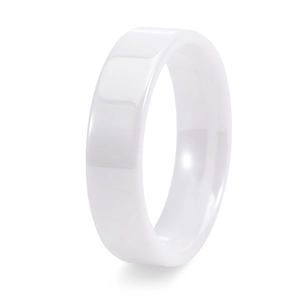 Detailed close-up showing the smooth polished finish of white ceramic ring from a side angle