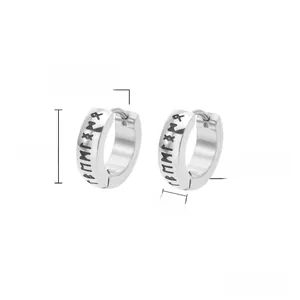 Detail of Nordic Viking rune engravings on polished 13mm stainless steel hoop earrings
