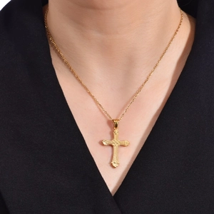 Polished gold titanium steel cross necklace with intricate baroque engraving for women