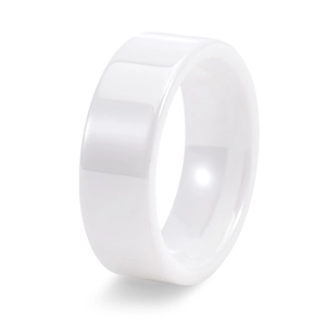 Detail view of a white polished ceramic ring featuring a minimalist mirror-finish surface