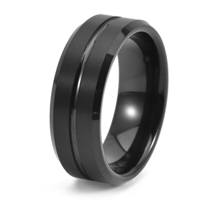 Macro detail of 8mm black tungsten ring with matte finish and polished center groove