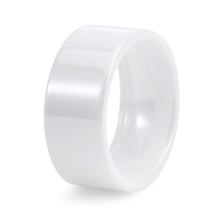 Close-up of minimalist white ceramic ring featuring a wide polished smooth surface