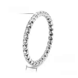 Detailed close-up of 2mm silver-tone titanium ring featuring a textured twisted rope design