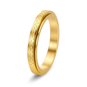 Détail macro d'une bague tournante dorée de 3mm avec motif en damier gravé