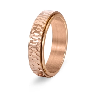 Modern rose gold spinner ring with hand-hammered texture and brushed inner band finish
