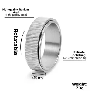 Macro view of 8mm rotatable men's titanium steel ring with textured anti-slip surface