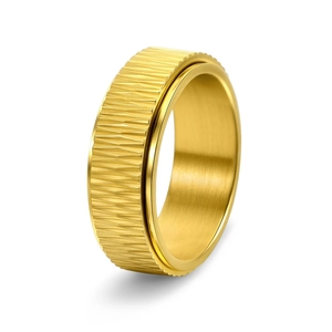 Rotating gold titanium steel ring with textured gear pattern and brushed inner finish