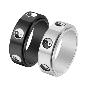 Spinning Yin Yang Tai Chi rings in black and silver stainless steel for men