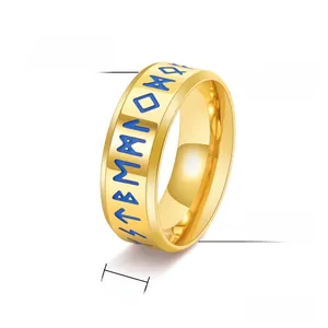 Detailed view of 8mm gold titanium ring with blue Nordic Viking runes and polished finish