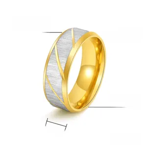 Detail of 8mm men's titanium ring featuring brushed finish and gold-tone diagonal grooves