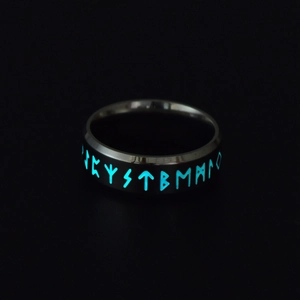 Glow-in-the-dark stainless steel ring with luminous blue Nordic Viking runes in the dark