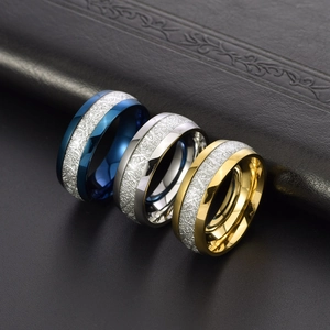 Polished titanium steel men's rings set with Widmanstätten meteorite pattern inlays