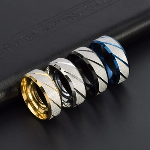 Men's 8mm brushed steel rings in gold, silver, black, and blue with diagonal stripes