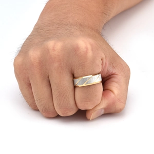 Detail of 8mm men's brushed ring with diagonal textures and two-tone metal finish