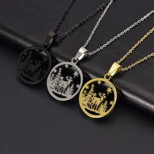 Detailed view of hollow Christmas deer necklaces in black, silver, and gold finishes