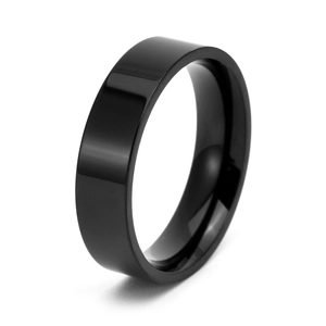 Macro detail of polished black titanium steel band with smooth reflective mirror finish